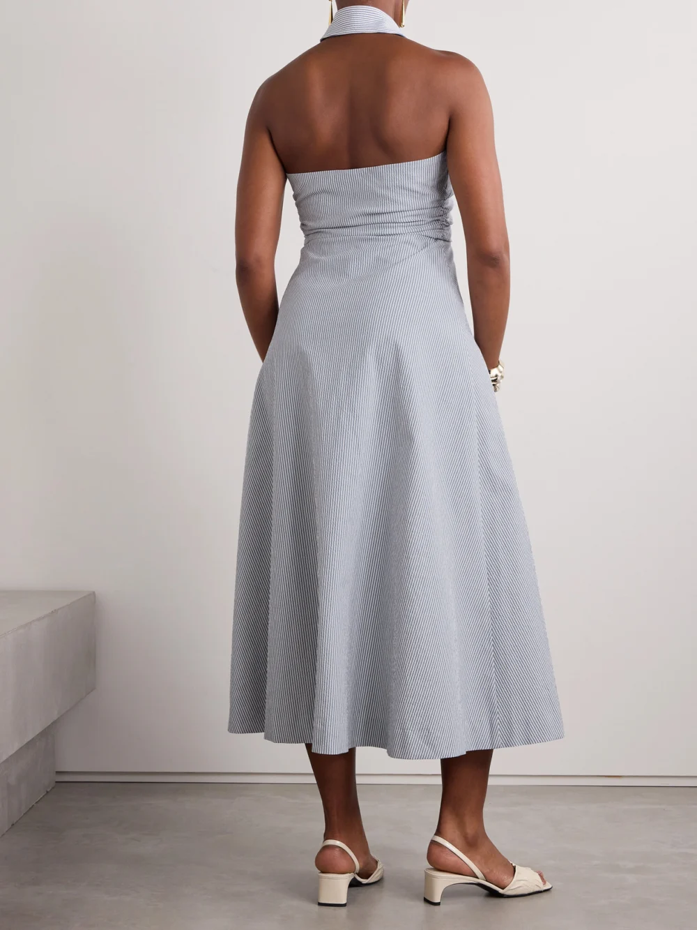 Back view of the Veronica Beard Mackey Striped Cotton-blend Seersucker Halterneck Midi Dress