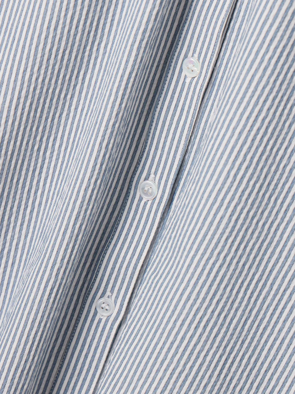 Close-up detail of the Veronica Beard Mackey Striped Cotton-blend Seersucker Halterneck Midi Dress