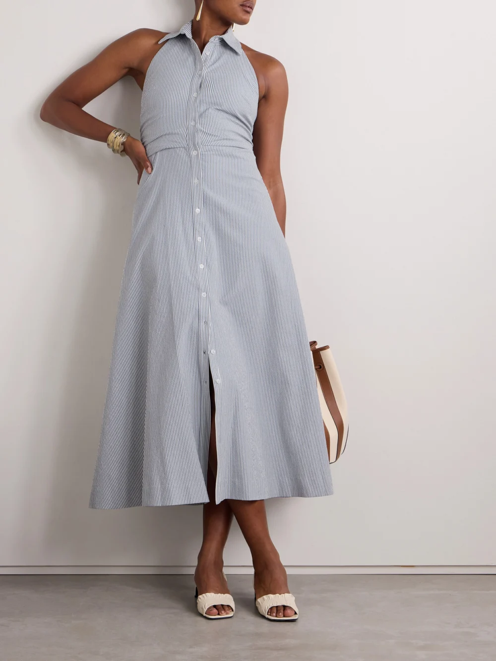 Veronica Beard Mackey Striped Cotton-blend Seersucker Halterneck Midi Dress, worn by a model
