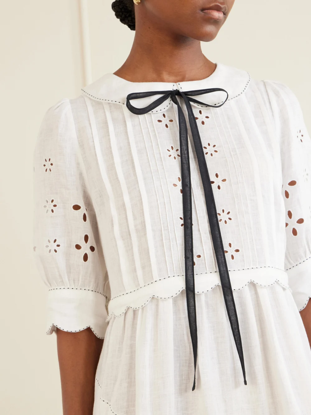 Close-up detail of the Vita Kin Bari Tie-detailed Broderie Anglaise-trimmed Linen Midi Dress