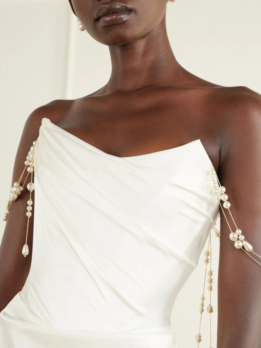 Close-up detail of the Vivienne Westwood Pearl-embellished Satin Gown