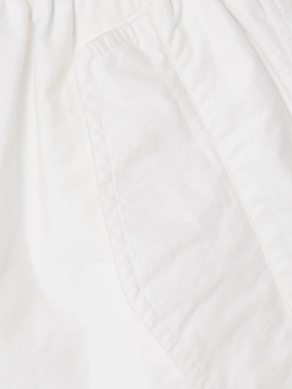 Close-up detail of the WARDROBE.NYC Beach Cotton-blend Shell Shorts
