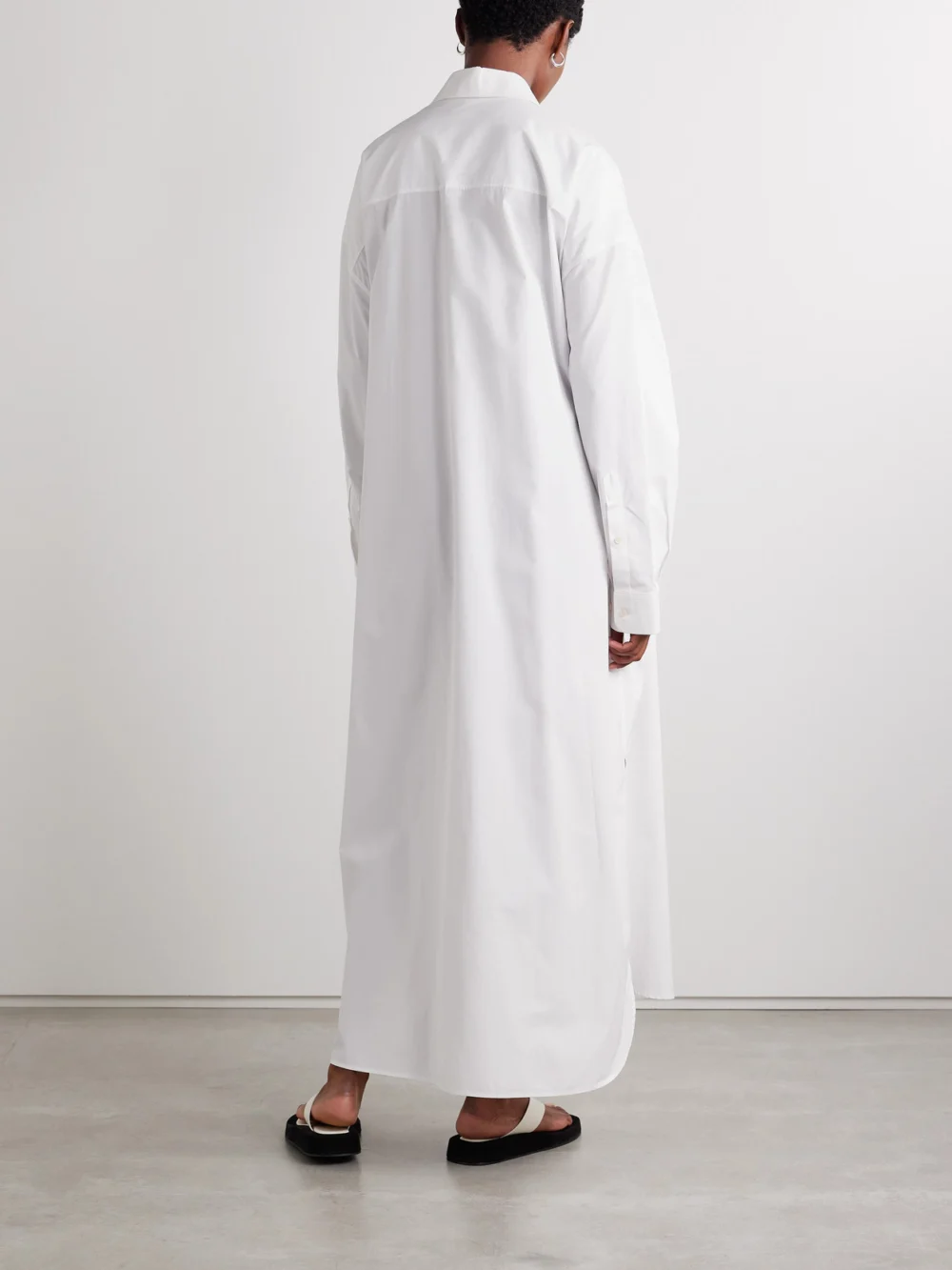 Back view of the WARDROBE.NYC Oversized Cotton-poplin Maxi Shirt Dress