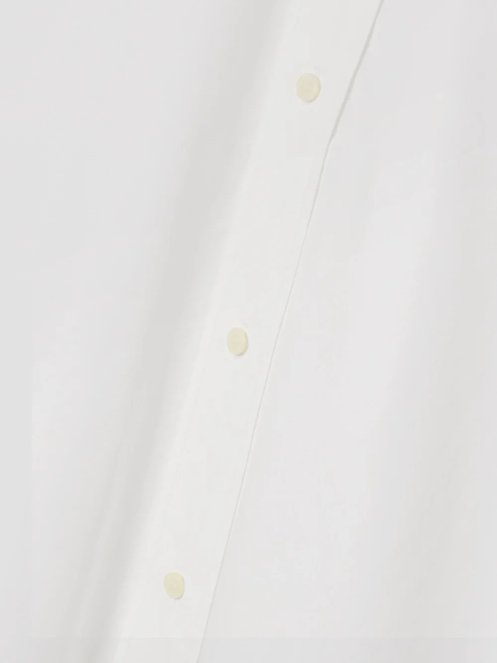Close-up detail of the WARDROBE.NYC Oversized Cotton-poplin Maxi Shirt Dress