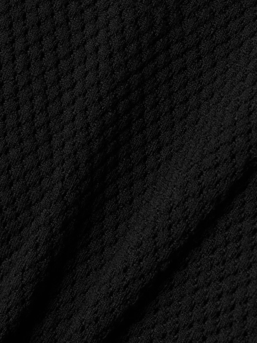 Close-up detail of the WARDROBE.NYC + Rhw Web Wool-blend Fishnet Bodysuit
