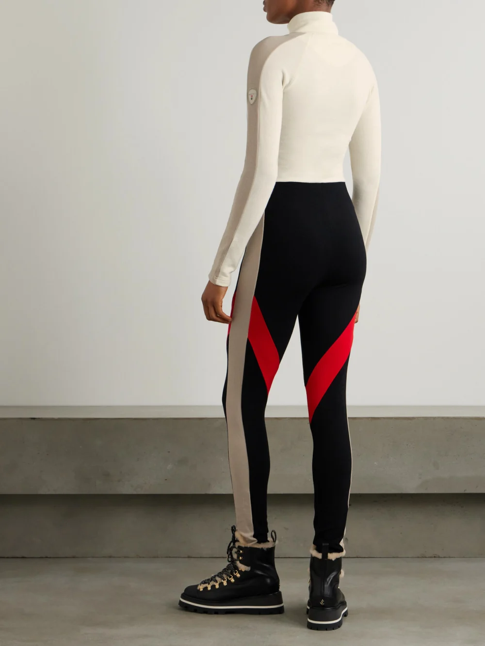 Back view of the We Norwegians + Inuikii Merino Wool-blend Piqué Jumpsuit
