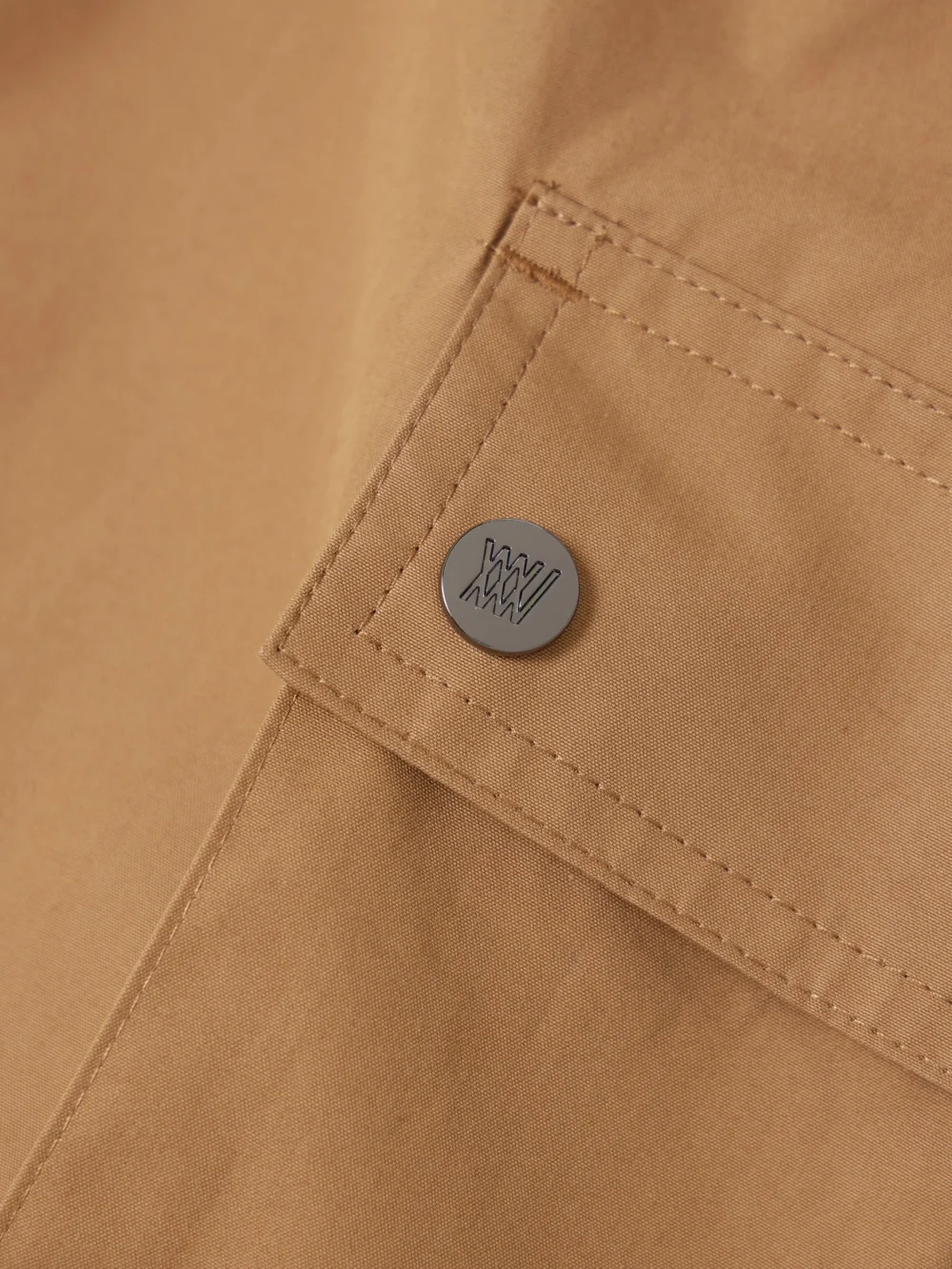 Close-up detail of the We Norwegians Lyngen Cotton Straight-leg Pants