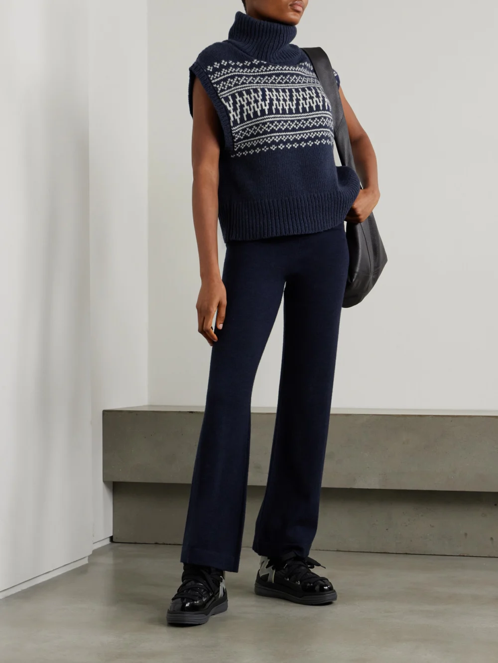 We Norwegians Setesdal Merino Wool and Cashmere-blend Turtleneck Vest, worn by a model