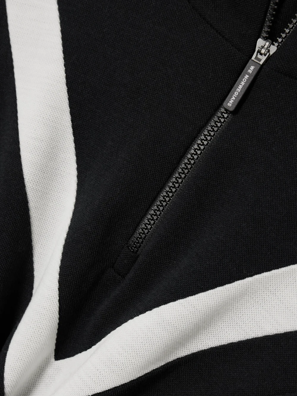 Close-up detail of the We Norwegians Voss Striped Merino Wool-blend Piqué Ski Top