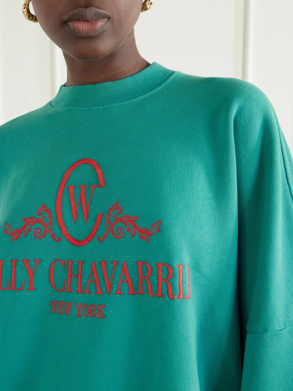 Close-up detail of the Willy Chavarria Chavantino Logo-embroidered Cotton-jersey Sweatshirt