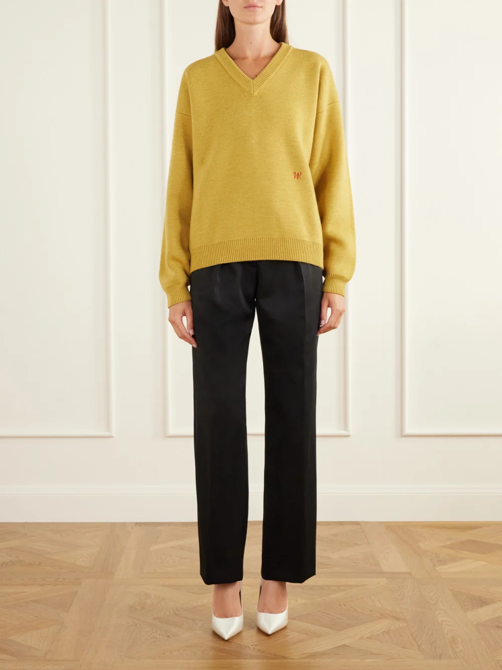Willy Chavarria Chavarria Logo-embroidered Rib-trimmed Wool Sweater, worn by a model