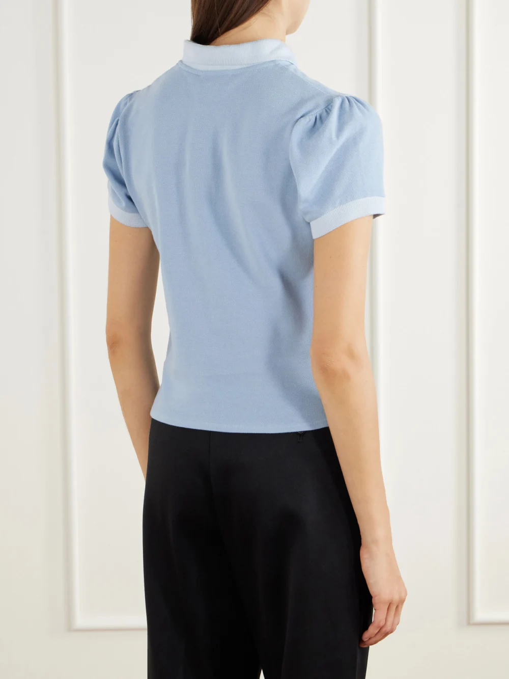Back view of the Willy Chavarria Chavela Logo-embroidered Cotton-piqué Polo Shirt