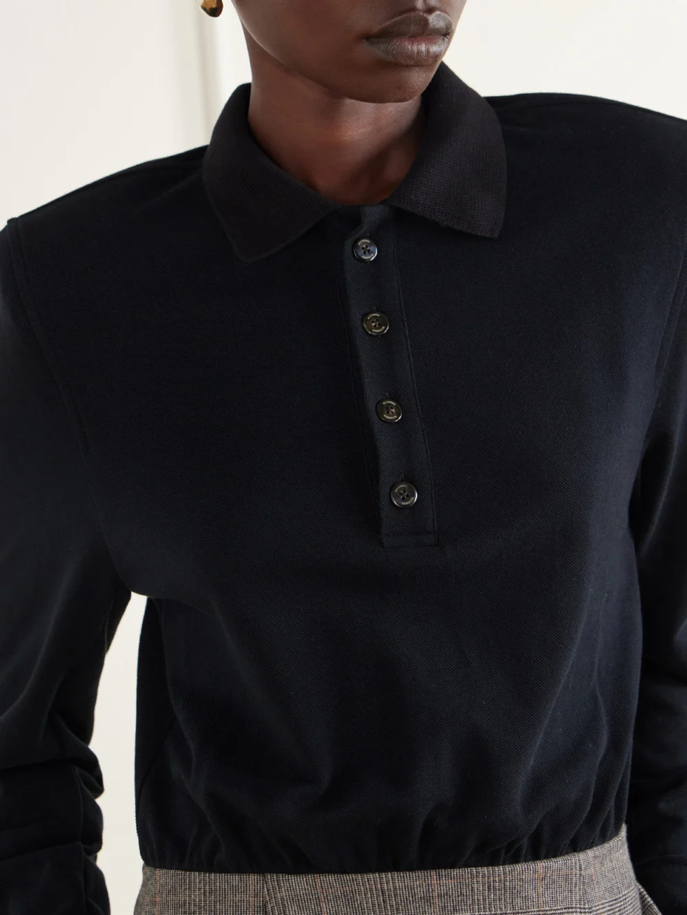 Close-up detail of the Willy Chavarria Polo Wool-blend Piqué and Prince of Wales Checked Midi Dress