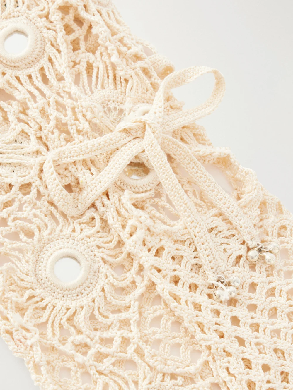 Close-up detail of the Yoshita 1967 Embellished Cotton Crochet-knit Stockings
