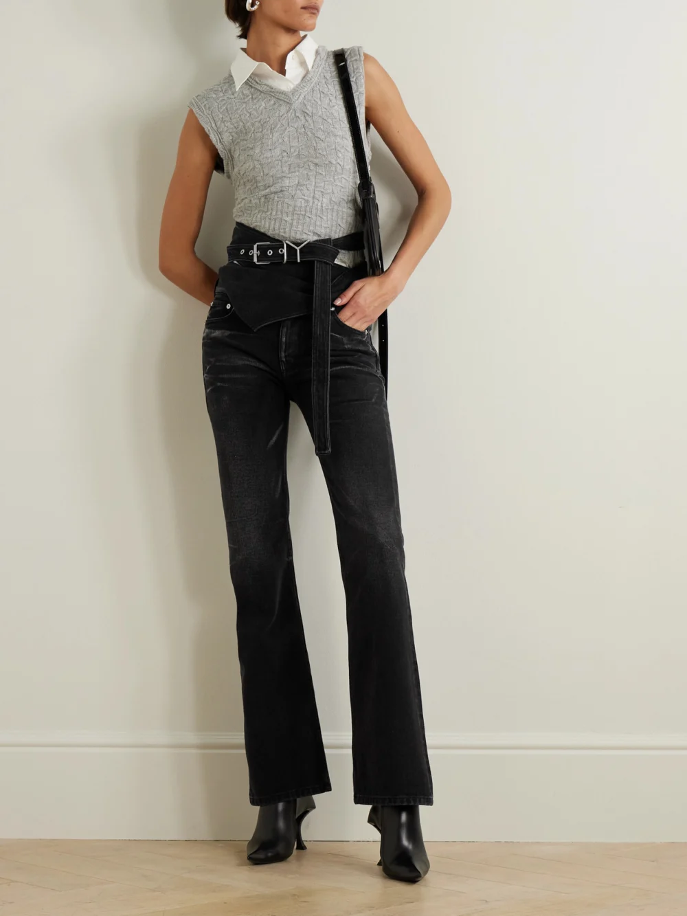 Y/Project Belted Bleached Low-rise Flared Jeans, worn by a model