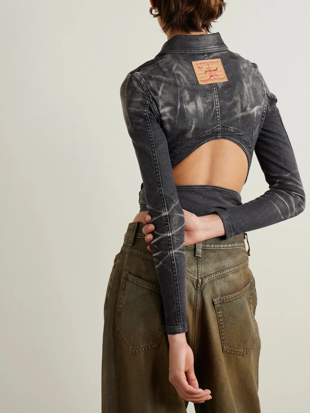 Back view of the Y/Project Cutout Bleached Denim Wrap Jacket