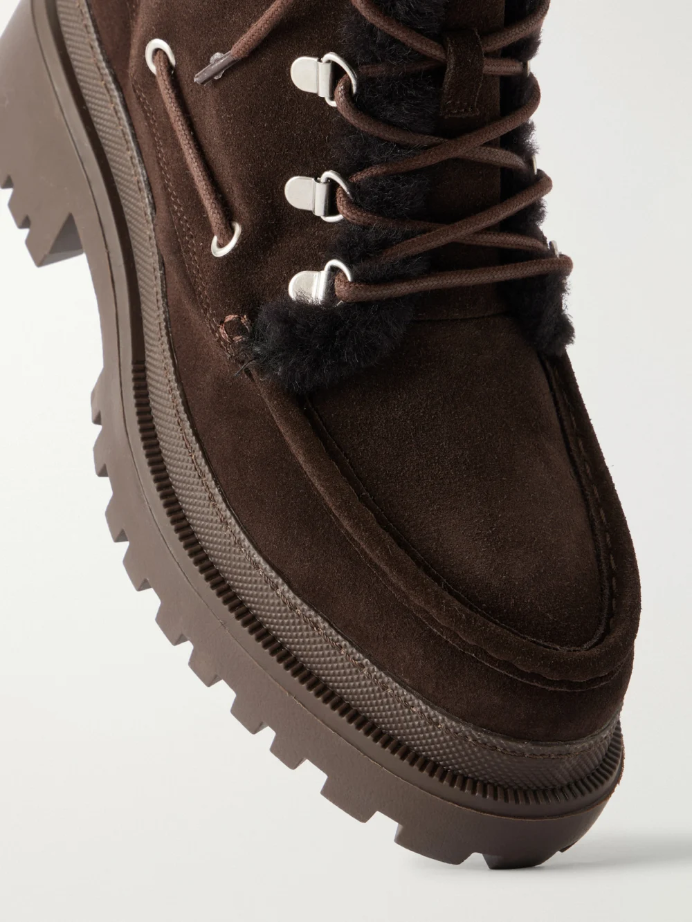 Close-up detail of the Yves Salomon Eyelet-detailed Brushed Shearling-trimmed Suede Ankle Boots