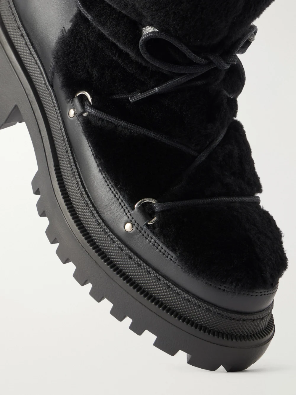 Close-up detail of the Yves Salomon Lace-detailed Shearling-trimmed Leather Ankle Boots