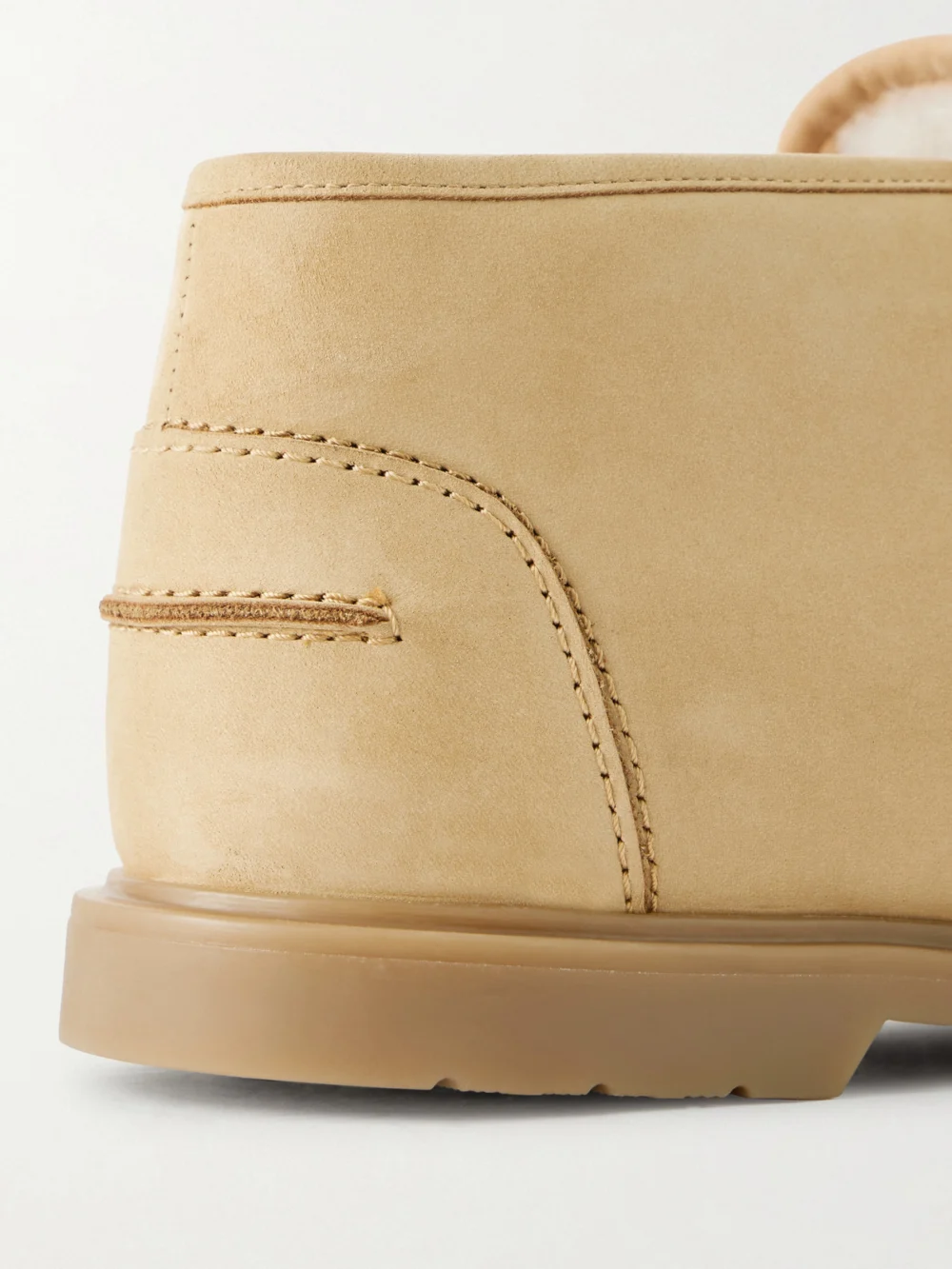 Close-up detail of the Yves Salomon Paneled Suede Ankle Boots
