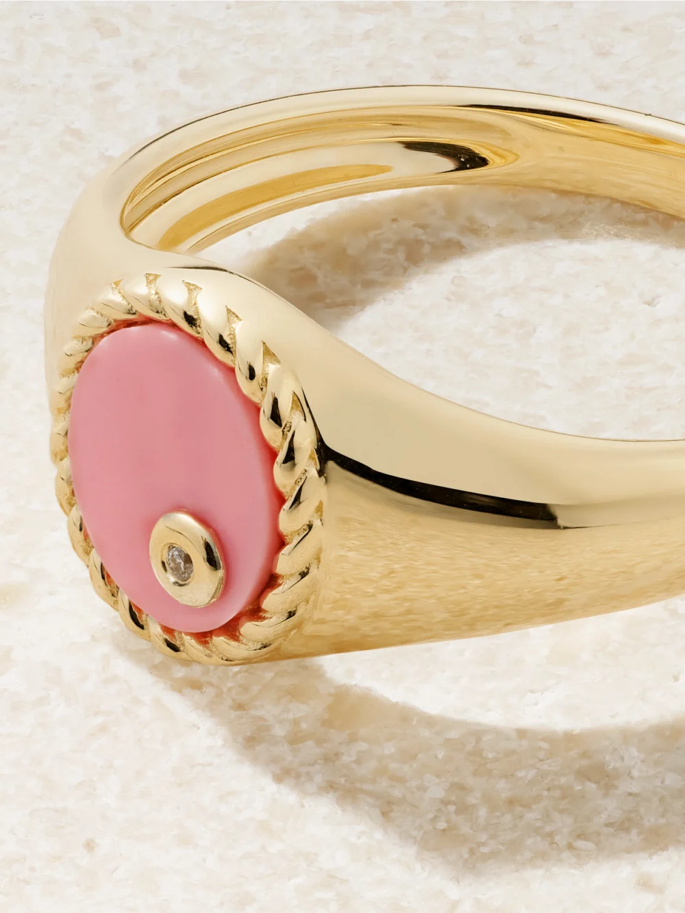 Close-up detail of the Yvonne Léon Baby Chevalière 9-karat Gold, Coral and Diamond Signet Ring