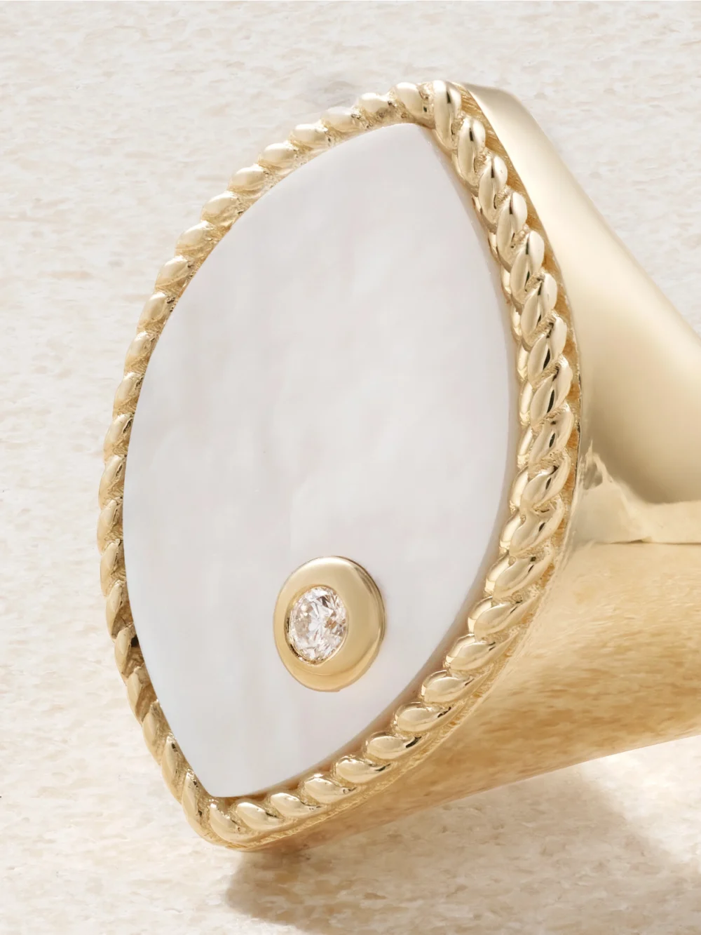 Close-up detail of the Yvonne Léon Chevalière Marquise 9-karat Gold, Mother-of-pearl and Diamond Signet Ring