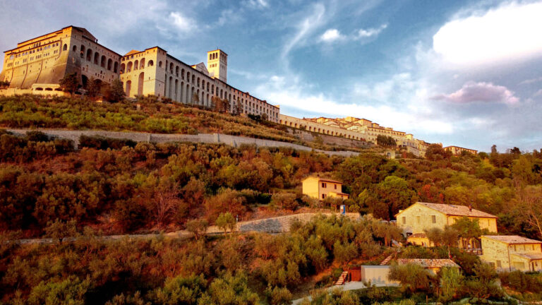 The Basilica of San Francesco and the hillside of Assisi in evening light, Borgo Antichi Orti Assisi