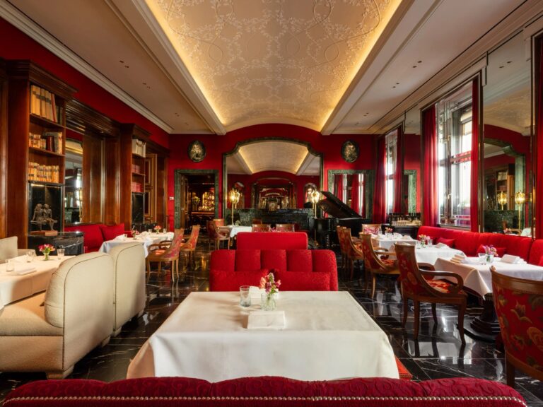 Salone Eva, the all-day restaurant in red and cream, Hassler Roma