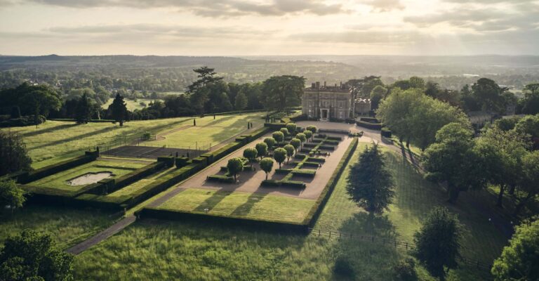 The formal gardens below the house at first light, looking out over the valley, Hedsor House
