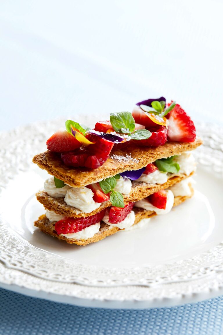 A strawberry mille-feuille with edible flowers, from the Florence package caterer Lettice Events, Hedsor House