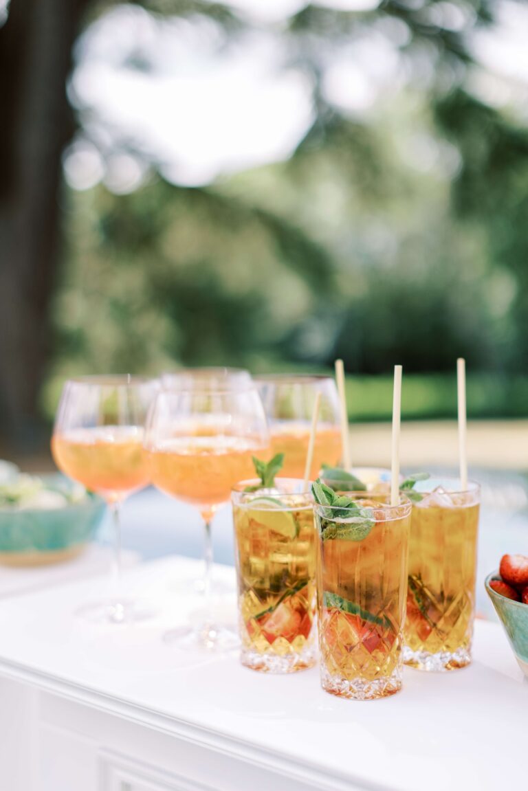 Summer cocktails and spritzes on a table outside, from a drinks reception, Hedsor House