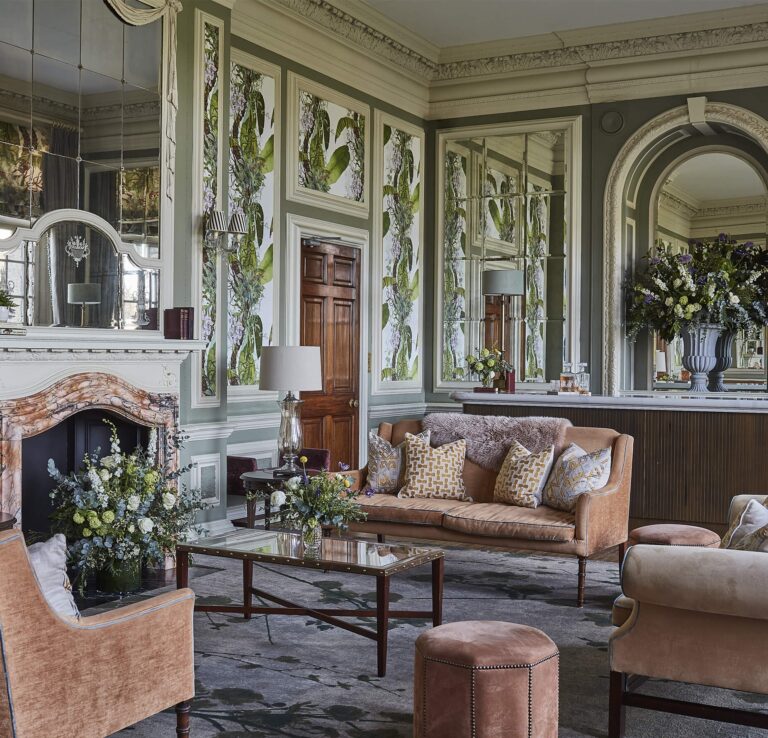 The Willingdon Bar, with botanical wall panels, mirrors and a marble fireplace, Hedsor House
