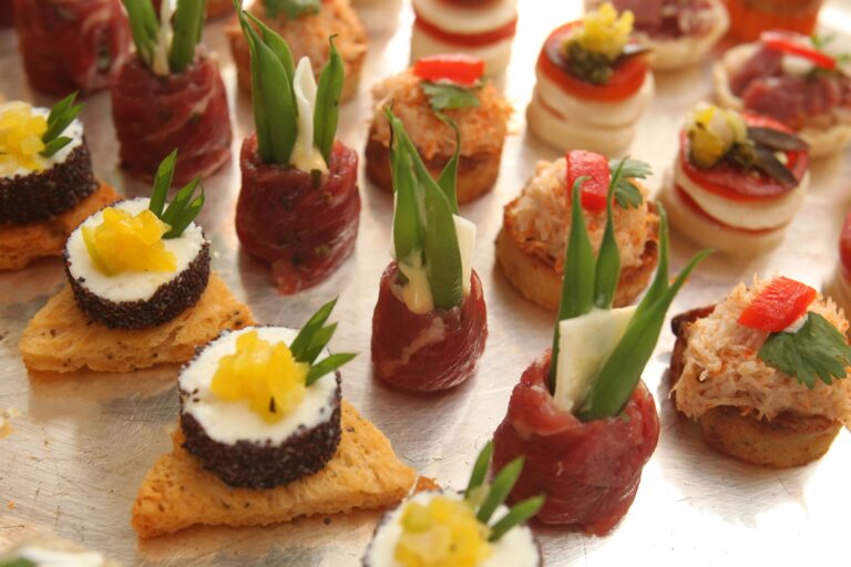 Canapés on a silver tray, including rolled beef with green beans and crab on toasted rounds, Leeds Castle