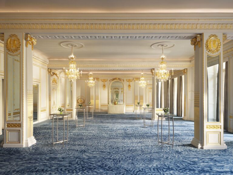 The Ballroom cleared of furniture, showing its gilded columns, patterned carpet and chandeliers, Mandarin Oriental Hyde Park