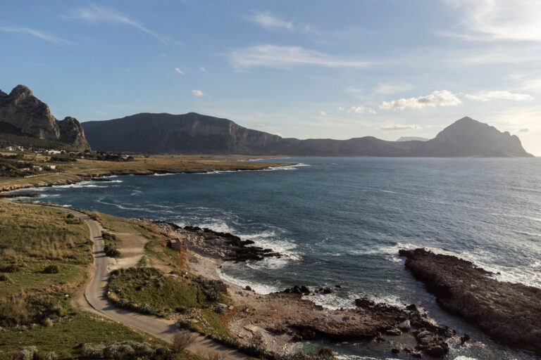 The rocky coast of the Gulf of Makari with Monte Cofano on the horizon, Pittalumari Makari