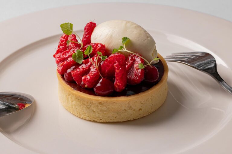 A raspberry tart topped with a scoop of white ice cream, Plaisterers' Hall
