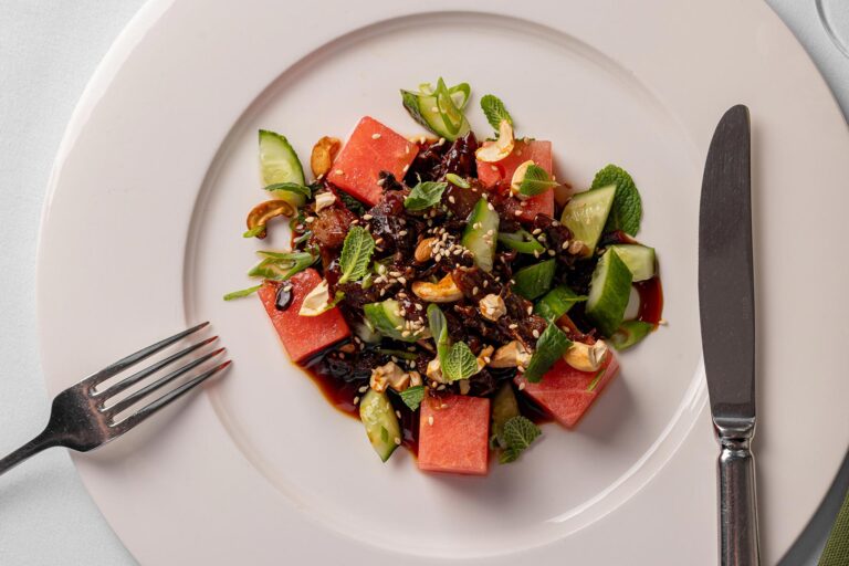 A watermelon and herb salad on a white plate, Plaisterers' Hall