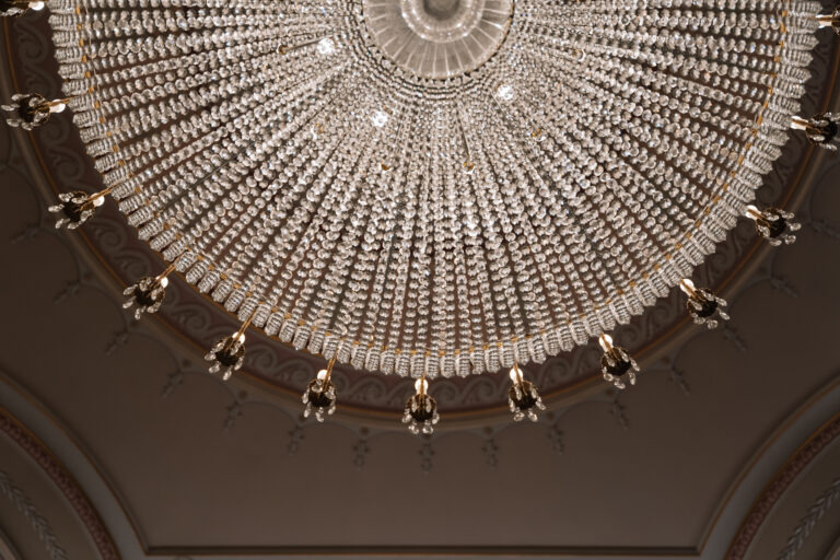 Looking up into a crystal chandelier from directly below, Plaisterers' Hall