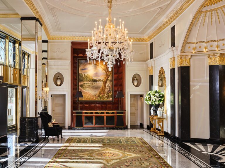 The lobby with its gilded columns, chandelier and marble floor inlaid with a pattern, The Dorchester