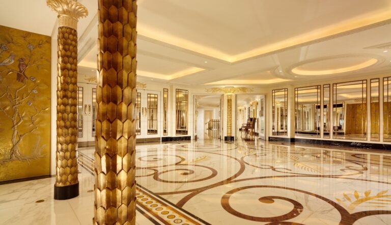 The marble-floored hall outside the Ballroom with gilded columns and mirrors, The Dorchester