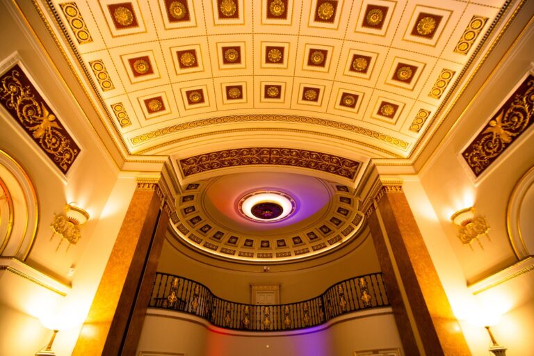 The coffered, gilded vaulted ceiling and curved gallery of the Ballroom, The Lansdowne Club
