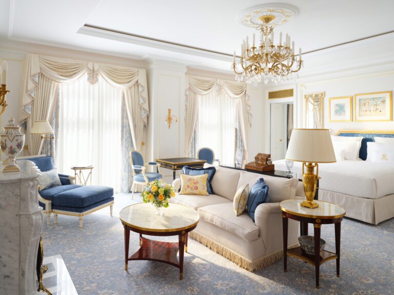 A Junior Suite with a sofa and sitting area beside the bed, The Ritz London