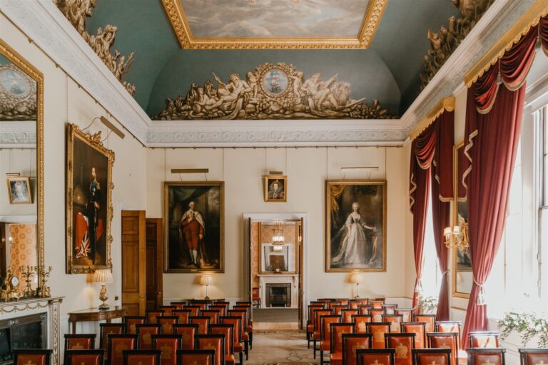 The Court Room set with rows of red leather chairs for a civil ceremony, Trinity House on Tower Hill