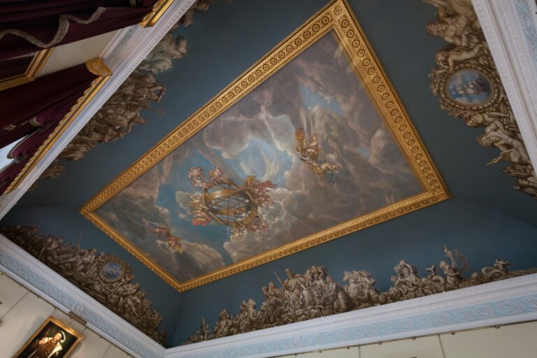 The allegorical painted ceiling in the Court Room, framed in gilt and sculpted relief, Trinity House on Tower Hill