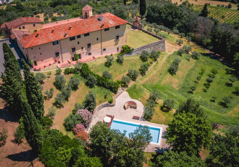 Aerial view of the villa and olive terraces with the pool below, Villa Il Cerretino