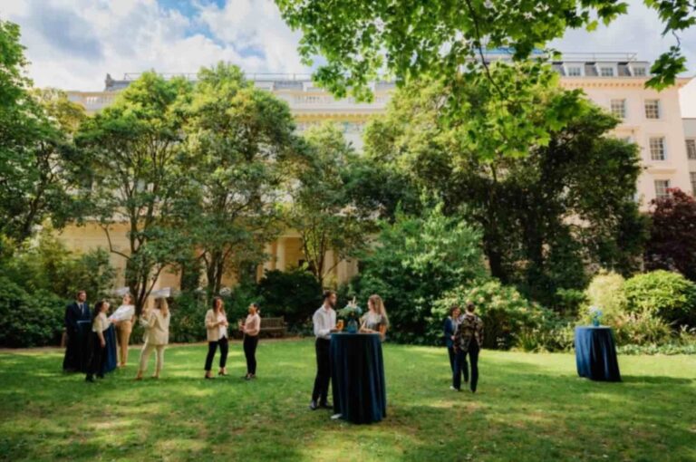The private Garden, guests on the lawn, 116 Pall Mall