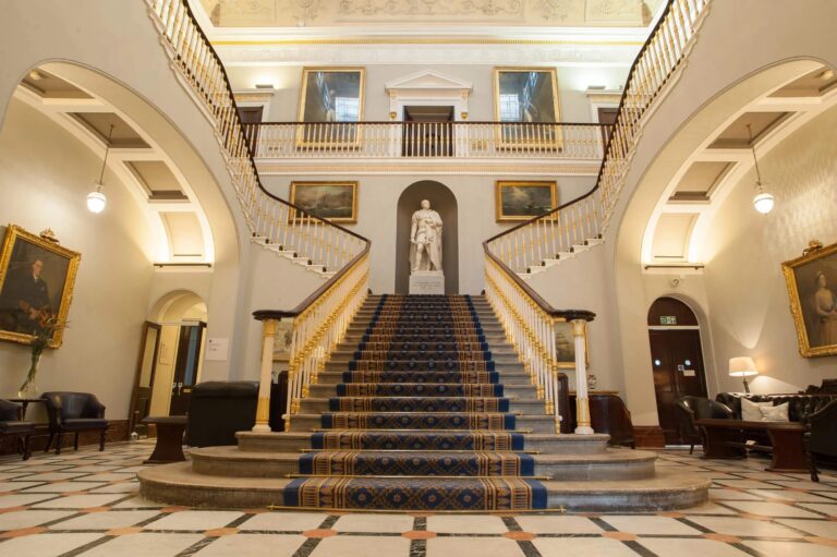 The Grand Staircase and marble entrance hall from the front doors, 116 Pall Mall