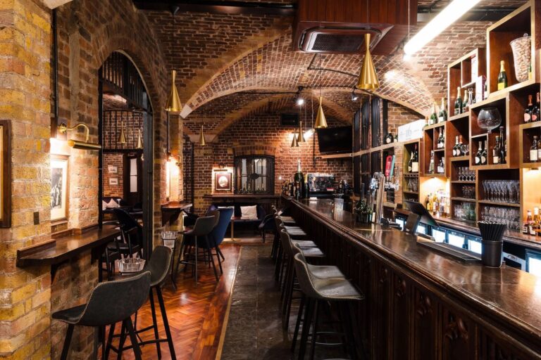 The Champagne Bar counter under the original Prince of Wales cellar vaults, 116 Pall Mall