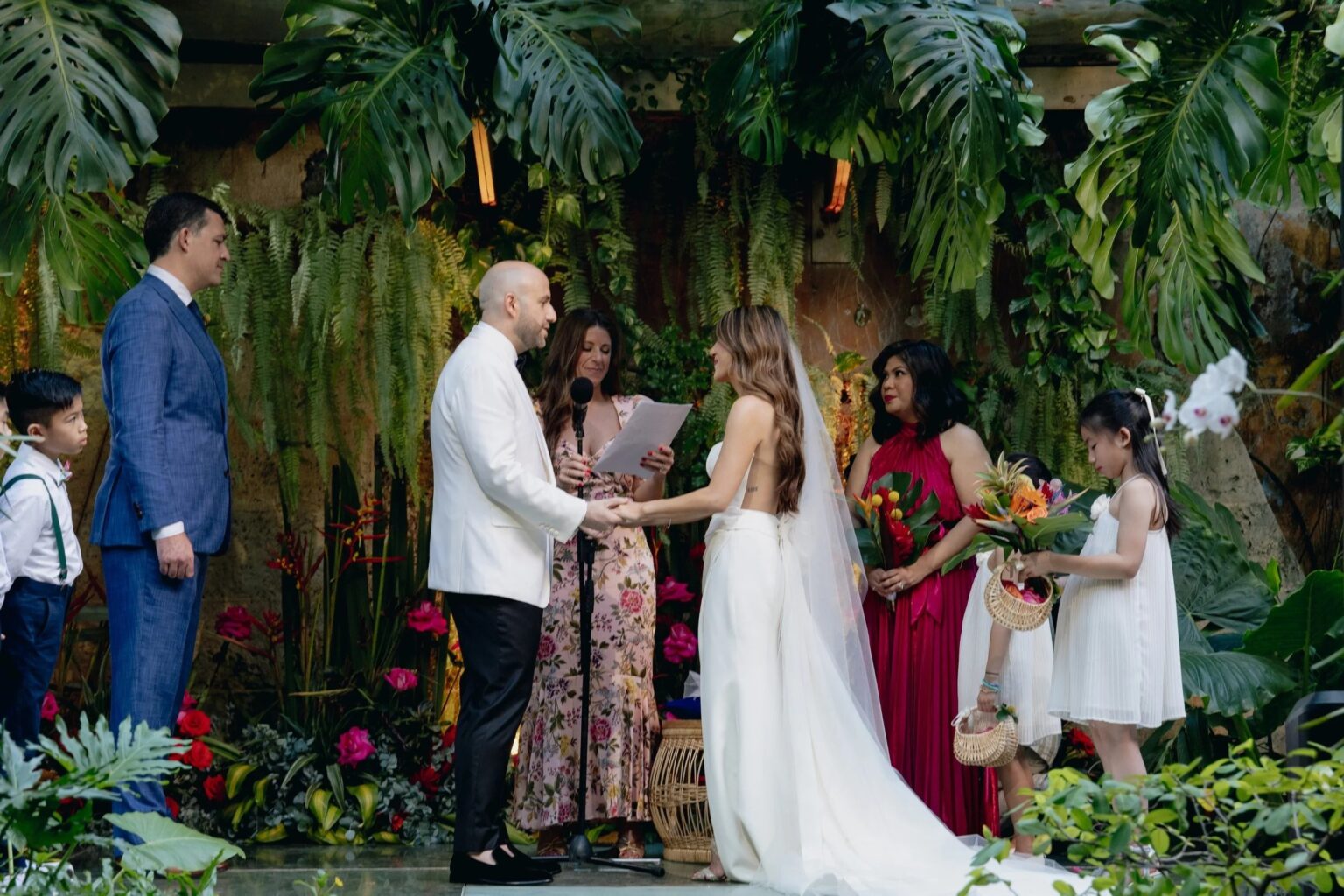 A ceremony among tropical foliage at a wedding in Cartagena, Colombia