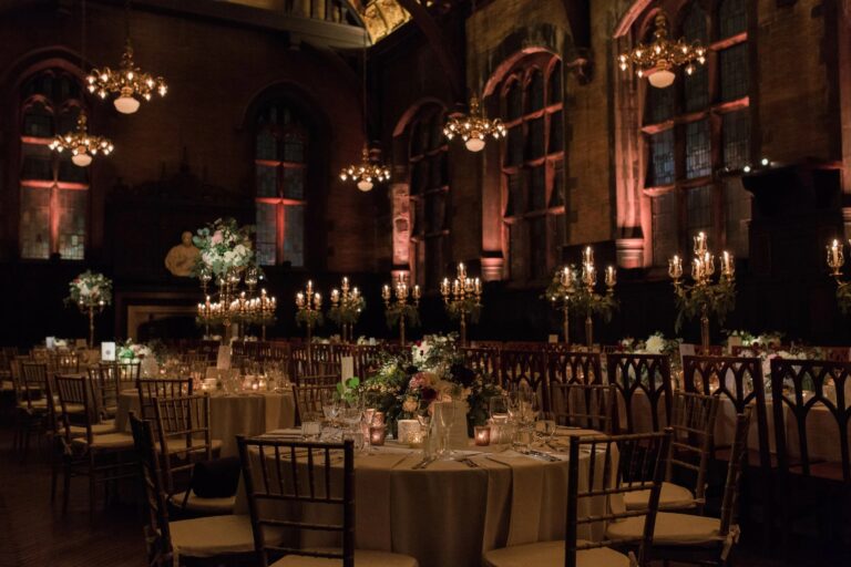 Evening reception in a panelled hall with warm pendant lighting at the High Line Hotel, 5th Avenue Weddings