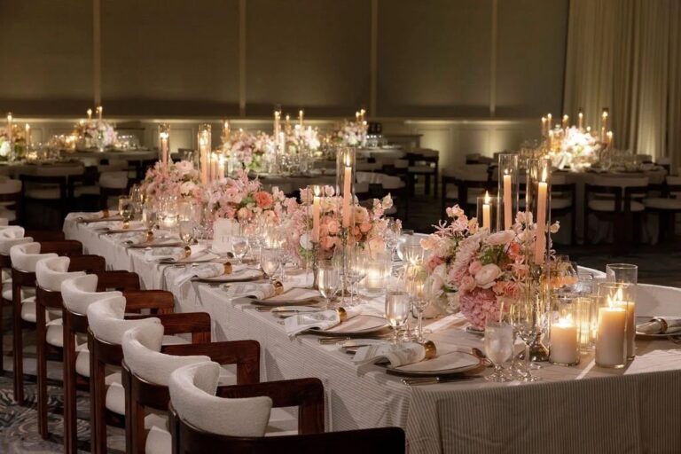 Long dining table with peach florals and a mass of candles, About Details Details
